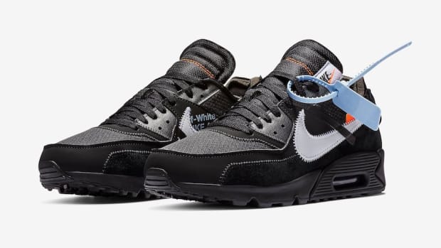 View of black and white Nike Air Max shoes.